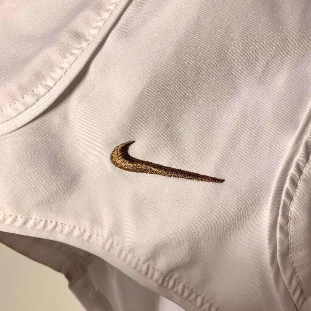 white Nike running shorts with elastic waist🤍
